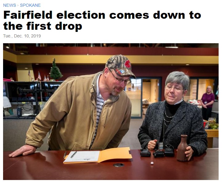 To break a 78-78 tie between two Fairfield Town Council candidates, Spokane County Auditor Vicky Dalton used two balls, each marked with a number assigned to a candidate. They were placed in a small milk bottle and then shaken. The ball that came out first marked candidate Steven Walk, on left, the winner over challenger Dave Watling, Mon., Dec. 9, 2019, at the Spokane County Elections Office. (Colin Mulvany / The Spokesman-Review)