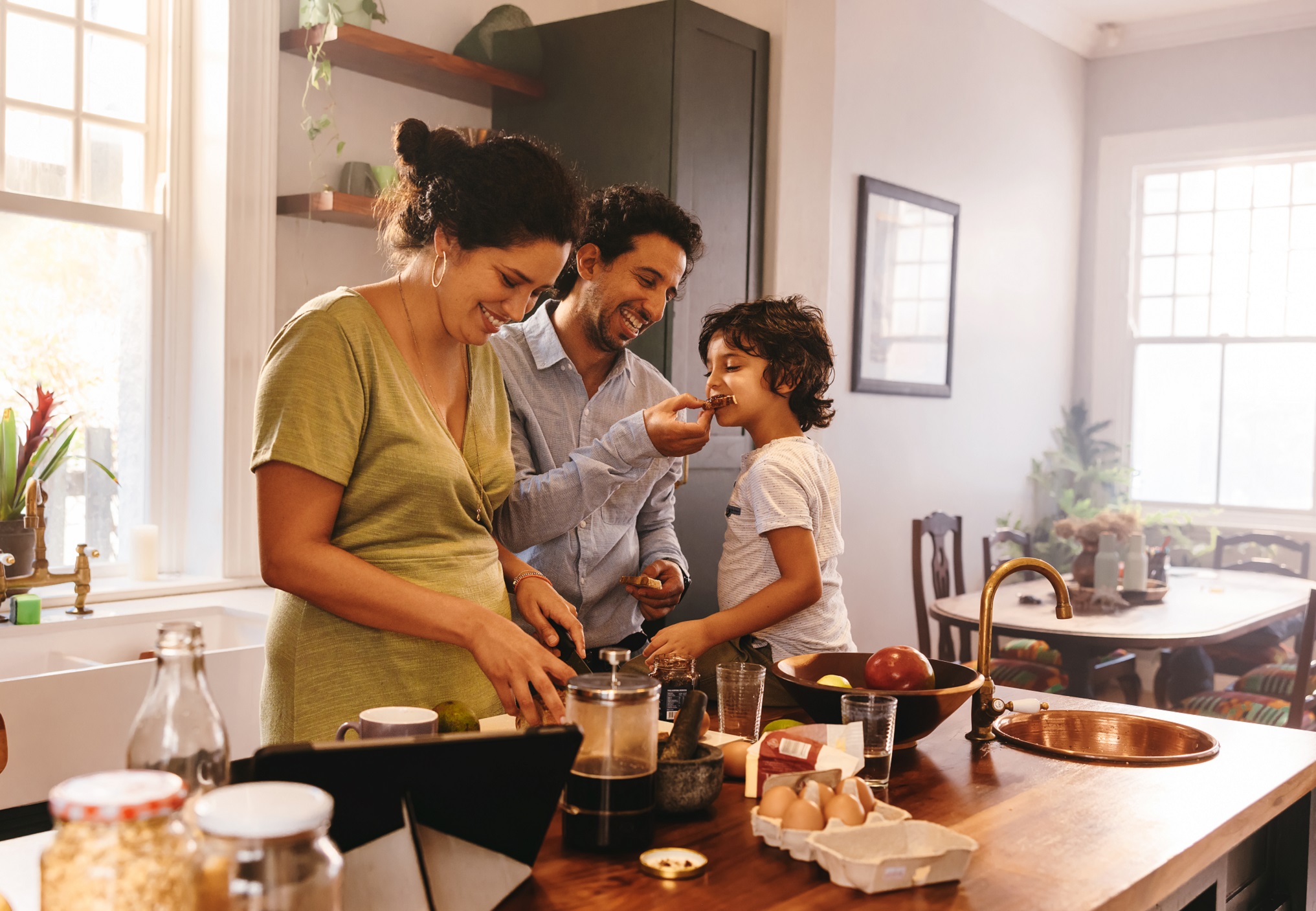 Family cooking a meal in the kitchen