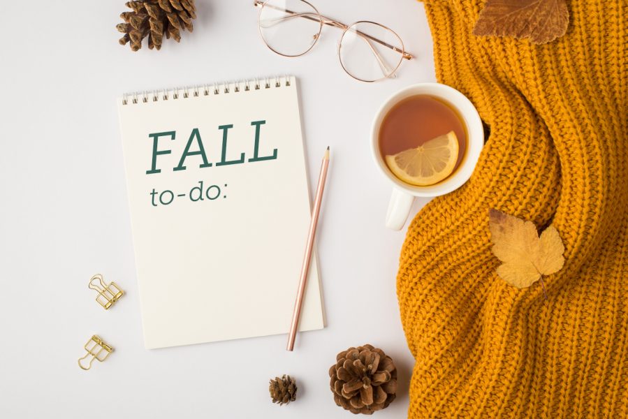 Fall to-do list: notepad and pencil with cup of tea